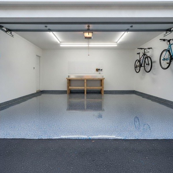 Illustrative example: a one-car garage with a blue and white flake epoxy floor